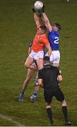 11 January 2023; Niall McConville of Armagh is tackled by Oisin Kiernan of Cavan during the Bank of Ireland Dr McKenna Cup Round 3 match between Cavan and Armagh at Kingspan Breffni in Cavan. Photo by Eóin Noonan/Sportsfile