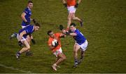 11 January 2023; Jemar Hall of Armagh is tackled by Gerard Smith of Cavan during the Bank of Ireland Dr McKenna Cup Round 3 match between Cavan and Armagh at Kingspan Breffni in Cavan. Photo by Eóin Noonan/Sportsfile