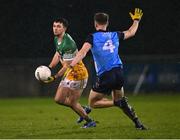 11 January 2023; Ruairí McNamee of Offaly in action against Daire Newcombe of Dublin during the O'Byrne Cup Group C Round 3 match between Dublin and Offaly at Parnell Park in Dublin. Photo by Piaras Ó Mídheach/Sportsfile