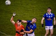 11 January 2023; Killian Clarke of Cavan in action against Rian O'Neill of Armagh during the Bank of Ireland Dr McKenna Cup Round 3 match between Cavan and Armagh at Kingspan Breffni in Cavan. Photo by Eóin Noonan/Sportsfile