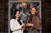13 January 2023; Olivia Divilly from Galway club Kilkerrin-Clonberne, right, is presented with The Croke Park/LGFA Player of the Month award for December 2022, by Ina Lazar, Sales Manager, The Croke Park, at The Croke Park in Jones Road, Dublin. Olivia was Player of the Match in the 2022 currentaccount.ie All-Ireland Senior Club Final against Donaghmoyne on December 10. Olivia scored 0-5, including two points from play, as Kilkerrin-Clonberne claimed back-to-back titles with victory over Monaghan opponents Donaghmoyne. Olivia was also honoured with the monthly award for January 2022, after producing a Player of the Match display against Mourneabbey in the 2021 currentaccount.ie All-Ireland Senior Club Final, which was played in January 2022. Photo by Seb Daly/Sportsfile