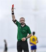13 January 2023; Referee Christopher Ryan shows the red card to Donal Conlon of Sligo, not pictured, during the Connacht FBD League Semi-Final match between Sligo and Roscommon at NUI Galway Connacht GAA Air Dome in Bekan, Mayo. Photo by Piaras Ó Mídheach/Sportsfile