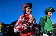 14 January 2023; Jockey Davy Russell, left, walks out alongside Daryl Jacob before the Race Displays hurdle at Fairyhouse Racecourse in Meath. Photo by David Fitzgerald/Sportsfile