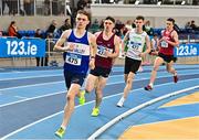 14 January 2023; Sean McGinley of Finn Valley AC, Donegal, left, on his way to winning the under 23 men's 1500m during the 123.ie National Junior and U23 Indoor Athletics Championships at the National Indoor Arena in Dublin. Photo by Sam Barnes/Sportsfile