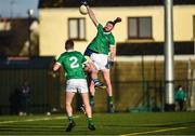 14 January 2023; Brian Fanning of Limerick in action against Liam McGrath of Tipperary during the McGrath Cup Group B match between between Tipperary and Limerick at Fethard Community Astroturf Pitch, Fethard in Tipperary. Photo by Tom Beary/Sportsfile