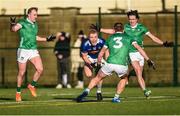 14 January 2023; Teddy Doyle of Tipperary in action against, from left, Adrian Enright, Sean O'Dea and Cian Sheehan of Limerick during the McGrath Cup Group B match between between Tipperary and Limerick at Fethard Community Astroturf Pitch, Fethard in Tipperary. Photo by Tom Beary/Sportsfile