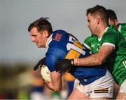 14 January 2023; Conor Sweeney of Tipperary in action against David Connolly of Limerick during the McGrath Cup Group B match between between Tipperary and Limerick at Fethard Community Astroturf Pitch, Fethard in Tipperary. Photo by Tom Beary/Sportsfile