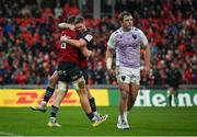 14 January 2023; Jack O’Donoghue of Munster, left, celebrates with team-mate Jack Crowley after scoring their side's second try during the Heineken Champions Cup Pool B Round 3 match between Munster and Northampton Saints at Thomond Park in Limerick. Photo by Brendan Moran/Sportsfile