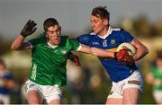 14 January 2023; Conor Sweeney of Tipperary is tackled by Paul Maher of Limerick during the McGrath Cup Group B match between between Tipperary and Limerick at Fethard Community Astroturf Pitch, Fethard in Tipperary. Photo by Tom Beary/Sportsfile