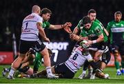 14 January 2023; Alex Wootton of Connacht is tackled by Matthieu Voisin of CA Brive during the EPCR Challenge Cup Pool A Round 3 match between Connacht and CA Brive at The Sportsground in Galway. Photo by Ben McShane/Sportsfile