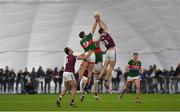 14 January 2023; Matthew Barrett and Mathew Tierney of Galway in action against Jordan Flynn and Matthew Ruane of Mayo during the Connacht FBD League Semi-Final match between Mayo and Galway at NUI Galway Connacht GAA Air Dome in Bekan, Mayo. Photo by Ray Ryan/Sportsfile