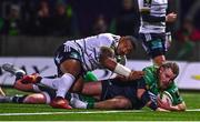 14 January 2023; Finlay Bealham of Connacht scores his side's second try despite the tackle of Abraham Papali'i of CA Brive during the EPCR Challenge Cup Pool A Round 3 match between Connacht and CA Brive at The Sportsground in Galway. Photo by Ben McShane/Sportsfile