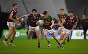 14 January 2023; Fenton Kelly of Mayo in action against Barry McHugh of Galway during the Connacht FBD League Semi-Final match between Mayo and Galway at NUI Galway Connacht GAA Air Dome in Bekan, Mayo. Photo by Ray Ryan/Sportsfile