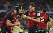 14 January 2023; Antoine Frisch, right, and Alex Kendellen of Munster celebrate victory after the Heineken Champions Cup Pool B Round 3 match between Munster and Northampton Saints at Thomond Park in Limerick. Photo by Brendan Moran/Sportsfile