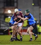 14 January 2023; Gearóid McInerney of Galway in action against Paul Crummey, left, and James Madden of Dublin during the Walsh Cup Group 1 Round 2 match between Dublin and Galway at Parnell Park in Dublin. Photo by Daire Brennan/Sportsfile