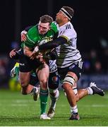 14 January 2023; Cathal Forde of Connacht is tackled by Nico Lee, hidden, and Matthieu Voisin of CA Brive during the EPCR Challenge Cup Pool A Round 3 match between Connacht and CA Brive at The Sportsground in Galway. Photo by Ben McShane/Sportsfile