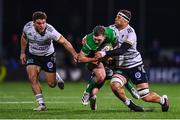 14 January 2023; Cathal Forde of Connacht is tackled by Nico Lee, hidden, and Matthieu Voisin of CA Brive during the EPCR Challenge Cup Pool A Round 3 match between Connacht and CA Brive at The Sportsground in Galway. Photo by Ben McShane/Sportsfile