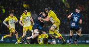 14 January 2023; Joel Sclavi of La Rochelle supported by teammate Ultan Dillane is tackled by Nick Timoney of Ulster during the Heineken Champions Cup Pool B Round 3 match between La Rochelle and Ulster at Stade Marcel Deflandre in La Rochelle, France. Photo by Ramsey Cardy/Sportsfile