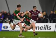 14 January 2023; Johnny Heaney of Galway in action against Fenton Kelly of Mayo during the Connacht FBD League Semi-Final match between Mayo and Galway at NUI Galway Connacht GAA Air Dome in Bekan, Mayo. Photo by Ray Ryan/Sportsfile