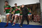 14 January 2023; Mayo assistant manager Stephen Rochford chats to Matthew Ruane and Jordan Flynn as they enter the Dome at half time in the Connacht FBD League Semi-Final match between Mayo and Galway at NUI Galway Connacht GAA Air Dome in Bekan, Mayo. Photo by Ray Ryan/Sportsfile