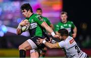 14 January 2023; Alex Wootton of Connacht evades the tackle of Enzo Hervé of CA Brive during the EPCR Challenge Cup Pool A Round 3 match between Connacht and CA Brive at The Sportsground in Galway. Photo by Ben McShane/Sportsfile