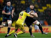 14 January 2023; Iain Henderson of Ulster is tackled by Antoine Hastoy of La Rochelle during the Heineken Champions Cup Pool B Round 3 match between La Rochelle and Ulster at Stade Marcel Deflandre in La Rochelle, France. Photo by Ramsey Cardy/Sportsfile