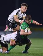14 January 2023; Colm Reilly of Connacht is tackled by Léo Carbonneau, top, and Tom Danovaro of CA Brive during the EPCR Challenge Cup Pool A Round 3 match between Connacht and CA Brive at The Sportsground in Galway. Photo by Ben McShane/Sportsfile