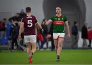 14 January 2023; Gavin Durcan of Mayo shake hands with Dylan McHugh of Galway after the Connacht FBD League Semi-Final match between Mayo and Galway at NUI Galway Connacht GAA Air Dome in Bekan, Mayo. Photo by Ray Ryan/Sportsfile