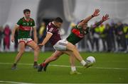 14 January 2023; Damien Comer of Galway in action against Jordan Flynn of Mayo during the Connacht FBD League Semi-Final match between Mayo and Galway at NUI Galway Connacht GAA Air Dome in Bekan, Mayo. Photo by Ray Ryan/Sportsfile