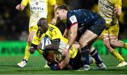 14 January 2023; Raymond Rhule of La Rochelle is tackled by Mike Lowry of Ulster during the Heineken Champions Cup Pool B Round 3 match between La Rochelle and Ulster at Stade Marcel Deflandre in La Rochelle, France. Photo by Ramsey Cardy/Sportsfile
