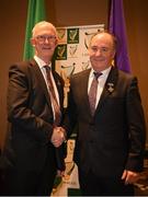 14 January 2023; The new Leinster Council Chairman Derek Kent, of Wexford, is congratulated by the outgoing Chairman Pat Teehan, of Offaly, left, as he takes over during the Leinster GAA Convention at Clayton Whites Hotel in Wexford. Photo by Ray McManus/Sportsfile