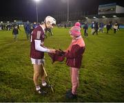 14 January 2023; Declan McLoughlin of Galway signs a jersey for Aoibhinn Dolan, aged 11, from Kiltormer, Co Galway after the Walsh Cup Group 1 Round 2 match between Dublin and Galway at Parnell Park in Dublin. Photo by Daire Brennan/Sportsfile