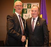 14 January 2023; The new Leinster Council Chairman Derek Kent, of Wexford, is congratulated by the outgoing Chairman Pat Teehan, of Offaly, left, as he takes over during the Leinster GAA Convention at Clayton Whites Hotel in Wexford. Photo by Ray McManus/Sportsfile