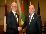 14 January 2023; The new Leinster Council Chairman Derek Kent, of Wexford, is congratulated by the outgoing Chairman Pat Teehan, of Offaly, left, as he takes over during the Leinster GAA Convention at Clayton Whites Hotel in Wexford. Photo by Ray McManus/Sportsfile