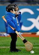 14 January 2023; Bobby Boyle, age 2, son of Tooreen hurler Joe Boyle, tries on his dad's helmet after the AIB GAA Hurling All-Ireland Intermediate Championship Final match between Monaleen of Limerick and Tooreen of Mayo at Croke Park in Dublin. Photo by Piaras Ó Mídheach/Sportsfile