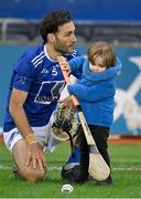 14 January 2023; Bobby Boyle, age 2, son of Tooreen hurler Joe Boyle, 5, with his dad's helmet and hurl after the AIB GAA Hurling All-Ireland Intermediate Championship Final match between Monaleen of Limerick and Tooreen of Mayo at Croke Park in Dublin. Photo by Piaras Ó Mídheach/Sportsfile