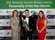 14 January 2023; SSE Airtricity sponsorship and marketing manager Leanne Sheill, left, and SSE Airtricity brand, advertising and sponsorship lead Ashley Morrow, right, with Men's Personality of the Year award recipient Shamrock Rovers manager Stephen Bradley during the SSE Airtricity / Soccer Writers Ireland Awards 2022 at The Clayton Hotel in Dublin. Photo by Stephen McCarthy/Sportsfile