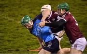 14 January 2023; Fergal Whitely of Dublin in action against Ronan Murphy, left, and Jack Fitzpatrick of Galway during the Walsh Cup Group 1 Round 2 match between Dublin and Galway at Parnell Park in Dublin. Photo by Daire Brennan/Sportsfile