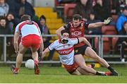 15 January 2023; Barry O'Hagan of Down tussles with Christopher McKaigue of Derry during the Bank of Ireland Dr McKenna Cup Semi-Final match between Down and Derry at Pairc Esler in Newry, Down. Photo by Ben McShane/Sportsfile