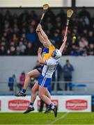 15 January 2023; David McInerney of Clare and Stephen Bennett of Waterford compete for a dropping ball during the Co-Op Superstores Munster Hurling League Group 1 match between Clare and Waterford at Cusack Park in Ennis, Clare. Photo by Brendan Moran/Sportsfile