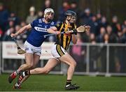 15 January 2023; Billy Drennan of Kilkenny in action against Ryan Mullaney of Laois on his way to score his side's first goal during the Walsh Cup Group 2 Round 2 match between Laois and Kilkenny at Kelly Daly Park in Rathdowney, Laois. Photo by Sam Barnes/Sportsfile
