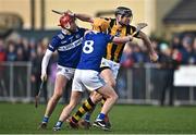 15 January 2023; Walter Walsh of Kilkenny in action against Fiachra Fennell, left, and James Keyes of Laois during the Walsh Cup Group 2 Round 2 match between Laois and Kilkenny at Kelly Daly Park in Rathdowney, Laois. Photo by Sam Barnes/Sportsfile