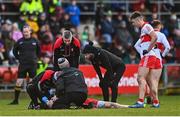 15 January 2023; Derry manager Rory Gallagher checks Gareth McKinless of Derry as he received medical attention during the Bank of Ireland Dr McKenna Cup Semi-Final match between Down and Derry at Pairc Esler in Newry, Down. Photo by Ben McShane/Sportsfile
