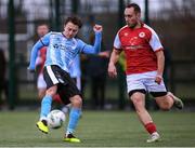 15 January 2023; Darragh Markey of Drogheda United in action against Vladislav Kreida of St Patrick's Athletic during the pre-season friendly match between St Patrick's Athletic and Drogheda United at the TU Dublin Blanchardstown in Dublin. Photo by Tyler Miller/Sportsfile