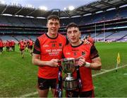 15 January 2023; Brothers David Clifford, left, and Paudie Clifford with the Corn Seamróga Chraobh Mháirtín after their side's victory in the AIB GAA Football All-Ireland Junior Championship Final match between Fossa of Kerry and Stewartstown Harps of Tyrone at Croke Park in Dublin. Photo by Piaras Ó Mídheach/Sportsfile