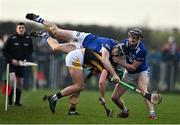 15 January 2023; Alan Murphy of Kilkenny  in action against PJ Scully, top, and Aaron Dunphy of Laois during the Walsh Cup Group 2 Round 2 match between Laois and Kilkenny at Kelly Daly Park in Rathdowney, Laois. Photo by Sam Barnes/Sportsfile