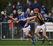 15 January 2023; Ross King of Laois in action against Des Dunne of Kilkenny during the Walsh Cup Group 2 Round 2 match between Laois and Kilkenny at Kelly Daly Park in Rathdowney, Laois. Photo by Sam Barnes/Sportsfile