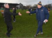 15 January 2023; Offaly manager Johnny Kelly, left, and Wexford manager Darragh Egan shake hands after the Walsh Cup Group 2 Round 2 match between Offaly and Wexford at St Brendan's Park in Birr, Offaly. Photo by Seb Daly/Sportsfile
