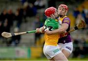 15 January 2023; Sam Bourke of Offaly in action against Lee Chin of Wexford during the Walsh Cup Group 2 Round 2 match between Offaly and Wexford at St Brendan's Park in Birr, Offaly. Photo by Seb Daly/Sportsfile