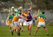 15 January 2023; Shane Reck of Wexford in action against Cathal O’Meara, left, and David Nally of Offaly during the Walsh Cup Group 2 Round 2 match between Offaly and Wexford at St Brendan's Park in Birr, Offaly. Photo by Seb Daly/Sportsfile